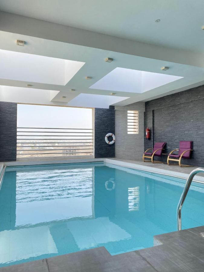 Alfalak Hotel Seeb Bagian luar foto